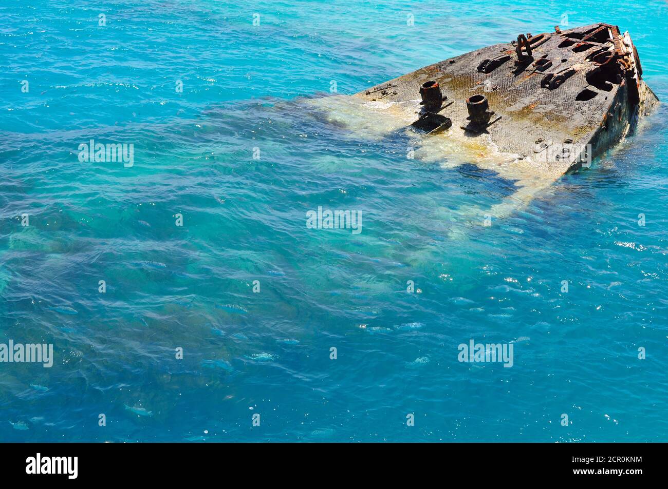 Shipwreck on Bermuda island, semi submerged ship HMS Vixen offshore